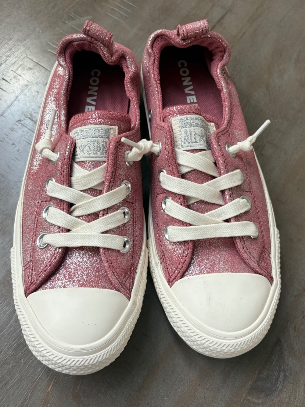 Converse All Star pink glitter, slip-on low top sneakers.